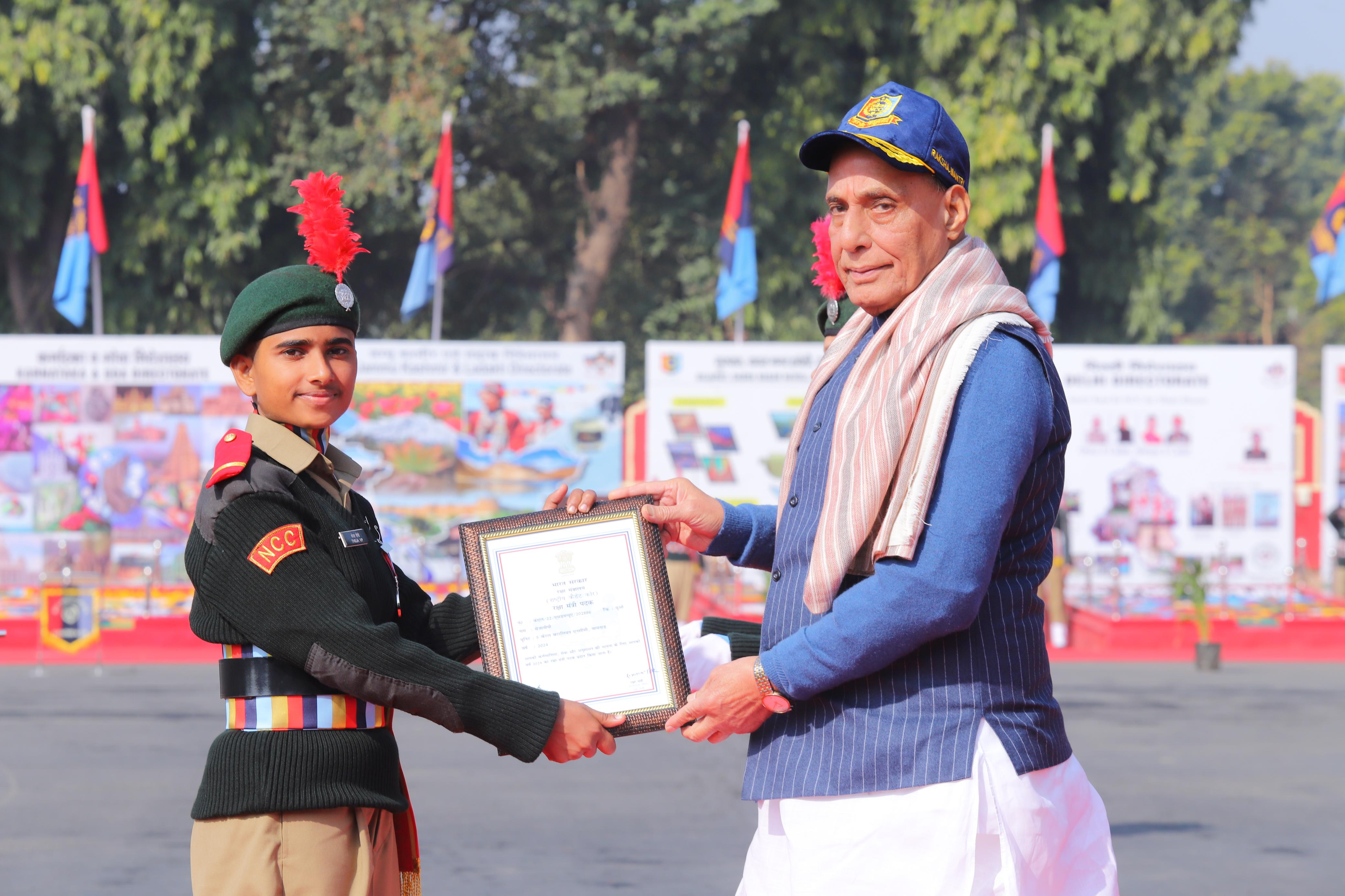 Under Officer V.P. Theja with dignitaries